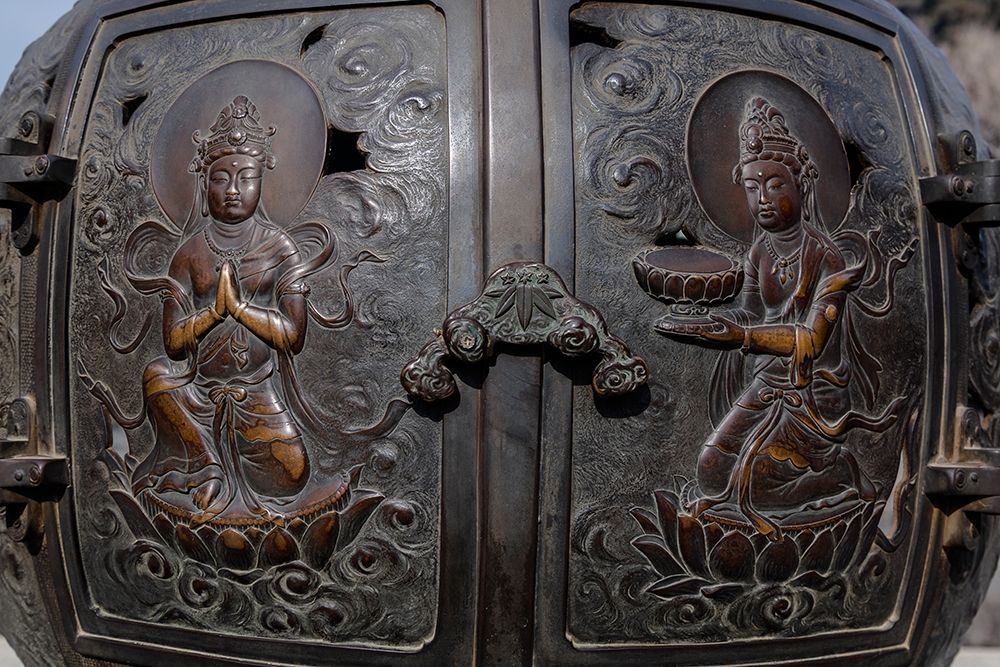 The ornate-engraved bronze doors to the outdoor incense burner of the Daibutsu-Kamakura-Japan art print by Sheila Haddad for $57.95 CAD